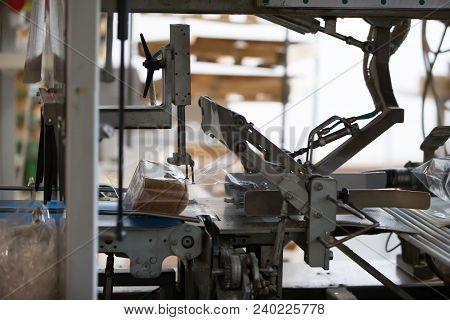 Industrial Line For Packaging Of Bakery Products. Packing Of Bread At The Factory.the Machine For Cu
