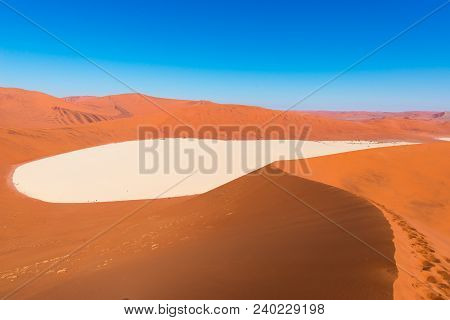 Sossusvlei Namibia, Clay And Salt Pan Surrounded By Majestic Sand Dunes. Namib Naukluft National Par