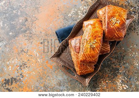 Traditional Turkish Pastry Roll With Chocolate And Nuts Filling - Pastich Served On A Vintage Tray.