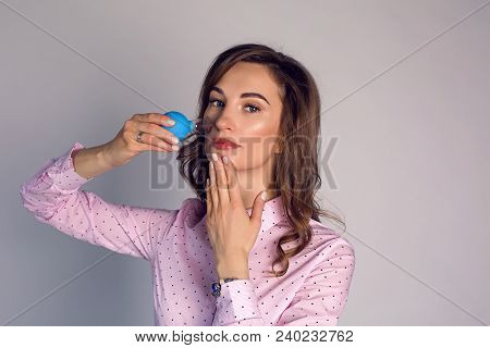 Young Girl Doing A Rejuvenation Procedure Using A Jar With A Suction Cup