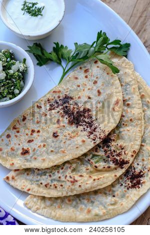 Azerbaijani Traditional Cuisine. Horizontal Shot Of Qutabs -flatbread With Greens. Served With Yogur