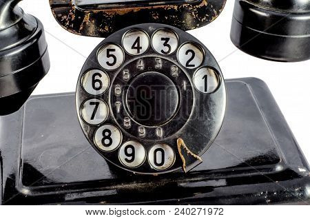 Disk Dialer Of Old Vintage Black Phone Close-up