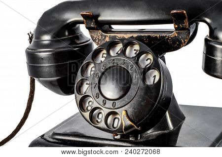 Disk Dialer Of Old Vintage Black Phone Close-up