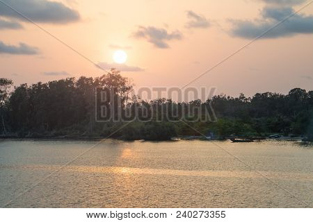 African Fishing Village - Small Wooden Fishing Canoe Alongside, During Sunset Time. Africa Landscape