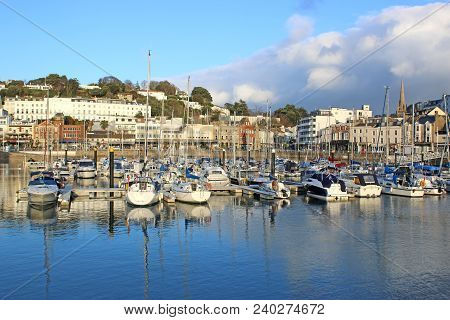 Boats Moored In Torquay Harbour In Torbay, Devon