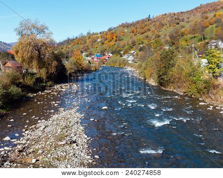 Autumn Carpathian Mountain White Tysa River Landscape With Multicolored Yellow-orange-red-brown Tree