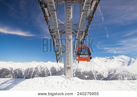 Bad Gastein, Austria - April 2,2018: People Ride Gondolas Of Cable Car In Bad Gastein.it Is An Austr