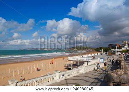 Santander,spain - July 1, 2017: El Sardinero Waterfront Promenade And Surfer Beach. El Sardinero Is 