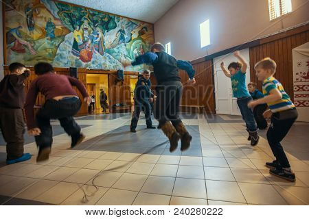 NIKOLSKY, RUSSIA - JAN 19, 2018: Training of children to use weapons in the framework of revival program of the Cossacks in the Leningrad region. Cossacks in St.Petersburg began its revival in 1990.
