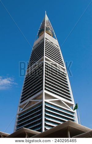 RIYADH - AUGUST 22: Sunset light at Al Faisaliah tower facade on August 22, 2016 in Riyadh, Saudi Arabia. Al Faisaliah towers is a luxury hotel and the most distinctive skyscraper in Saudi Arabia