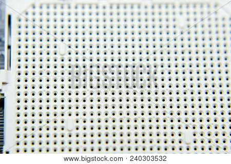 A Socket Under The Processor Of The Computer, Holes Under The Feet Of The Contacts. Electronic Board