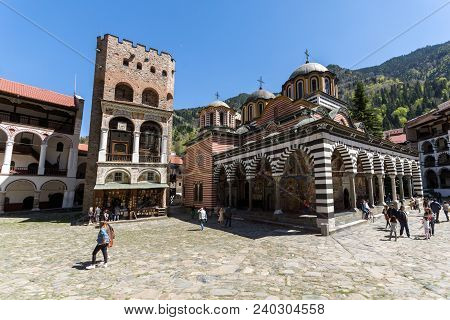 Rila Monastery, Bulgaria - April 21, 2018: Tourists Visiting Monastery Of Saint Ivan (john) Of Rila 