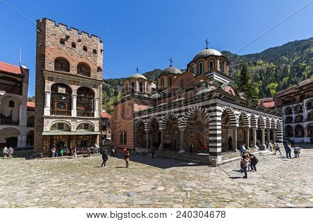 Rila Monastery, Bulgaria - April 21, 2018: Tourists Visiting Monastery Of Saint Ivan (john) Of Rila 