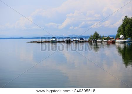 Boats At Pier On Uvildy Lake South Ural Russia