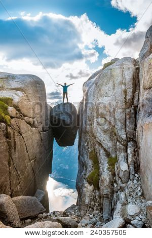 Woman On Kjeragbolten Travel In Norway Kjerag Mountains, Extreme Vacations, Adventure, Tourist, Happ