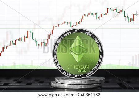 Ethereum Classic (etc) Coin; Ethereum Classic Cryptocurrency On The Background Of The Trading Chart