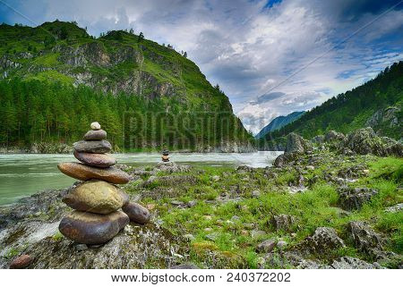 Stone Pyramids On Katun River Coast In Altai Mountains. Chemal, Altay Republic, Siberia, Russia.