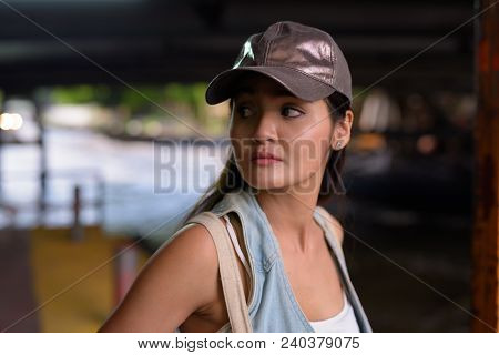 Portrait Of Young Beautiful Asian Tourist Woman Exploring The City Of Bangkok, Thailand