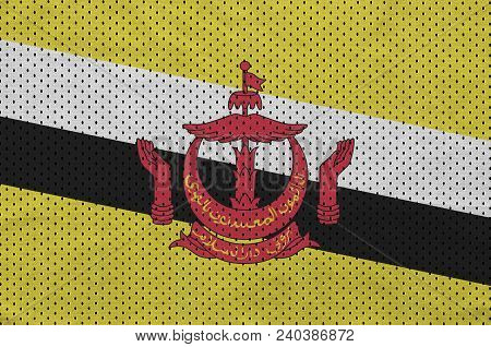 Brunei Darussalam Flag Printed On A Polyester Nylon Sportswear Mesh Fabric With Some Folds