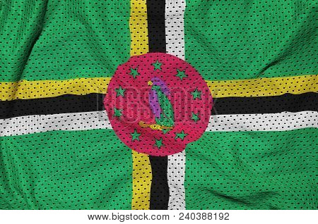 Dominica Flag Printed On A Polyester Nylon Sportswear Mesh Fabric With Some Folds