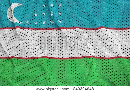 Uzbekistan Flag Printed On A Polyester Nylon Sportswear Mesh Fabric With Some Folds