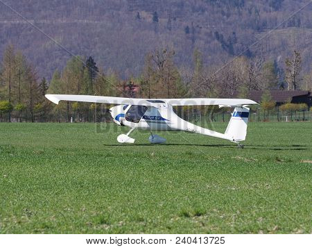 Bielsko-biala, Poland On April 2018: White Pipistrel Virus Sw Airplane On Grassy Airfield Closeup, T