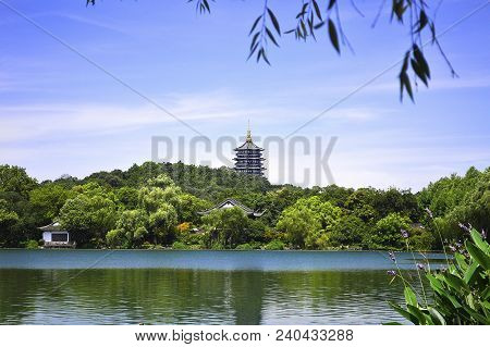 Hangzhou West Lake With Reflection Of Leifeng Pagoda In A Sunny Day. West Lake Is One Of The Famous 