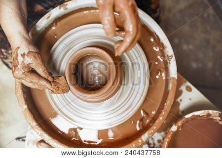A Spinning Potter's Wheel With A Vessel. Close-up.