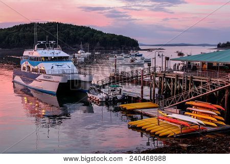 BAR HARBOUR - JULY 11: Beautiful Frenchman Bay sunset with docking boats in Bar Harbor, Maine on July, 11, 2013.