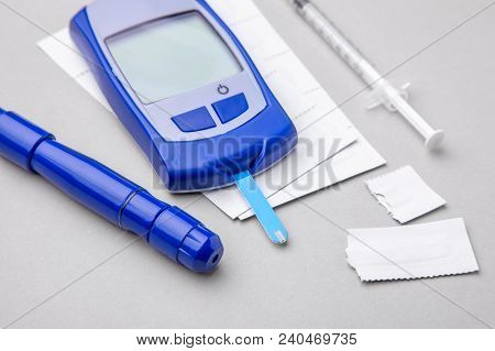 Diabetes Mellitus, Increased Blood Sugar Levels. Gray Background.