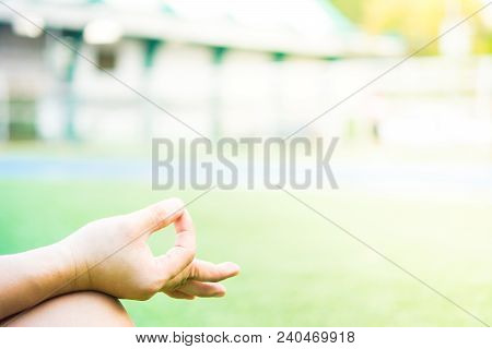 Hand Of Maditation Person Is Maditating In Stadium
