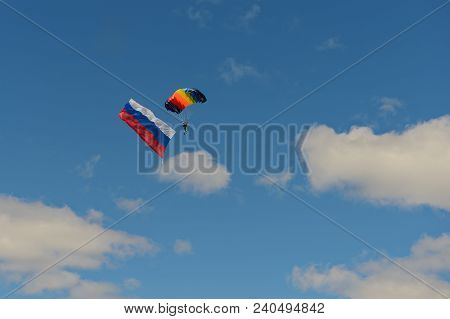 May 9, 2018: A Paratrooper With The Flag Of Russia Descends To The Ground. Cheboksary. Russia.