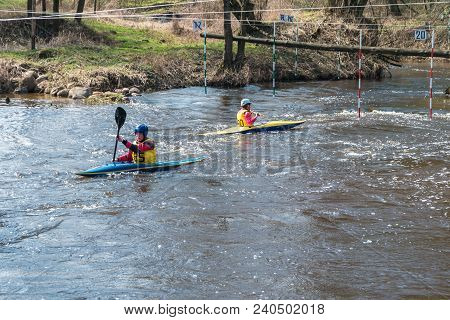 Grodno, Belarus - April, 2018: Kayak Freestyle Competition On Fast Cold Water River Strenuously Rowi