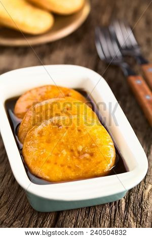 Chilean Sopaipilla Pasada Deep-fried Pastry Covered In Chancaca Cane Sugar Sauce, A Popular Snack In