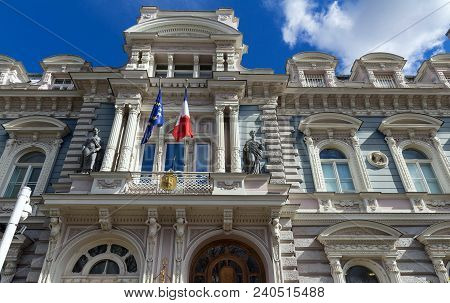 Riga, Latvia. Embassy Of France In Latvia. Facade Of Building Under Blue Clear Sky At Sunny Spring D
