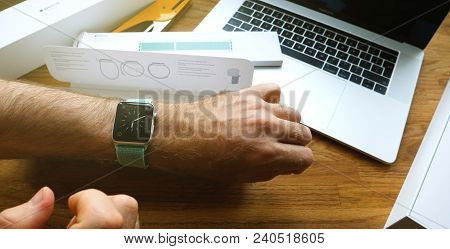 Paris, France - Apr 24, 2018: Checking Time On The New Apple Watch Series 3 Smartwatch Change Strap 