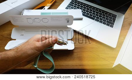 Paris, France - Apr 24, 2018: New Apple Watch Series 3 Smartwatch Change Strap To The New 42mm Marin