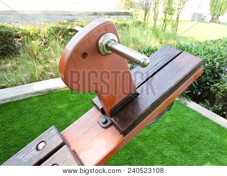 Children Playground, Wooden Horse Seesaw, Teeter Totter Or Teeterboard In Outdoor Park.