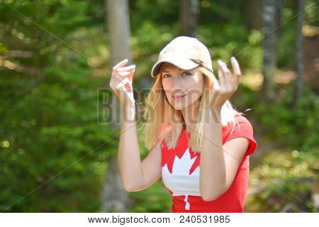 Girl In A T-shirt With A Maple Leaf Symbol Of Canada