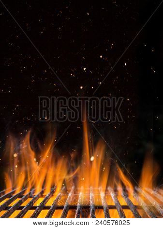 Empty flaming charcoal grill with open fire, ready for product placement.