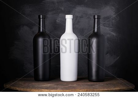 Wine Bottle Mock-up. Red Wine Bottle On Wooden Background
