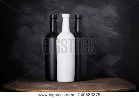 Wine Bottle Mock-up. Red Wine Bottle On Wooden Background