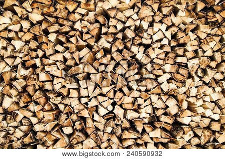 The Pattern Of Firewood Stacked To Woodpile