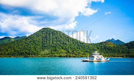 Ferry Sailing Across The Ocean At Summer At Day