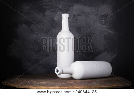 Wine Bottle Mock-up. Red Wine Bottle On Wooden Background