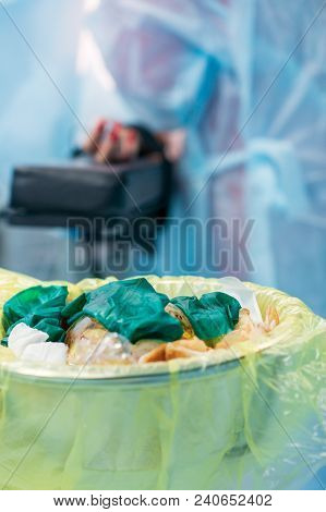 Medical Bloody Waste In Trash Bin. Close Up