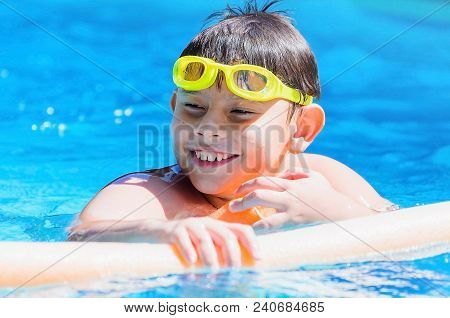 Happy Boy On The Swimming Pool, Summertime.