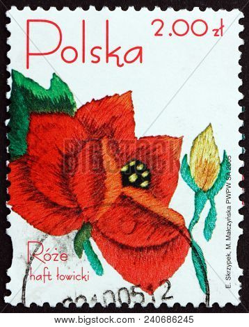 Poland - Circa 2005: A Stamp Printed In The Poland Shows Embroided Rose From Lowicz Region, Circa 20