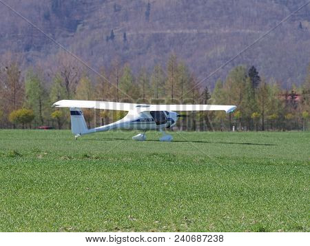 Bielsko-biala, Poland On April 2018: View Of White Pipistrel Virus Sw Airplane On Grassy Airfield Cl
