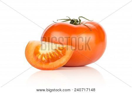 Red Tomato And One Slice Isolated On White Background